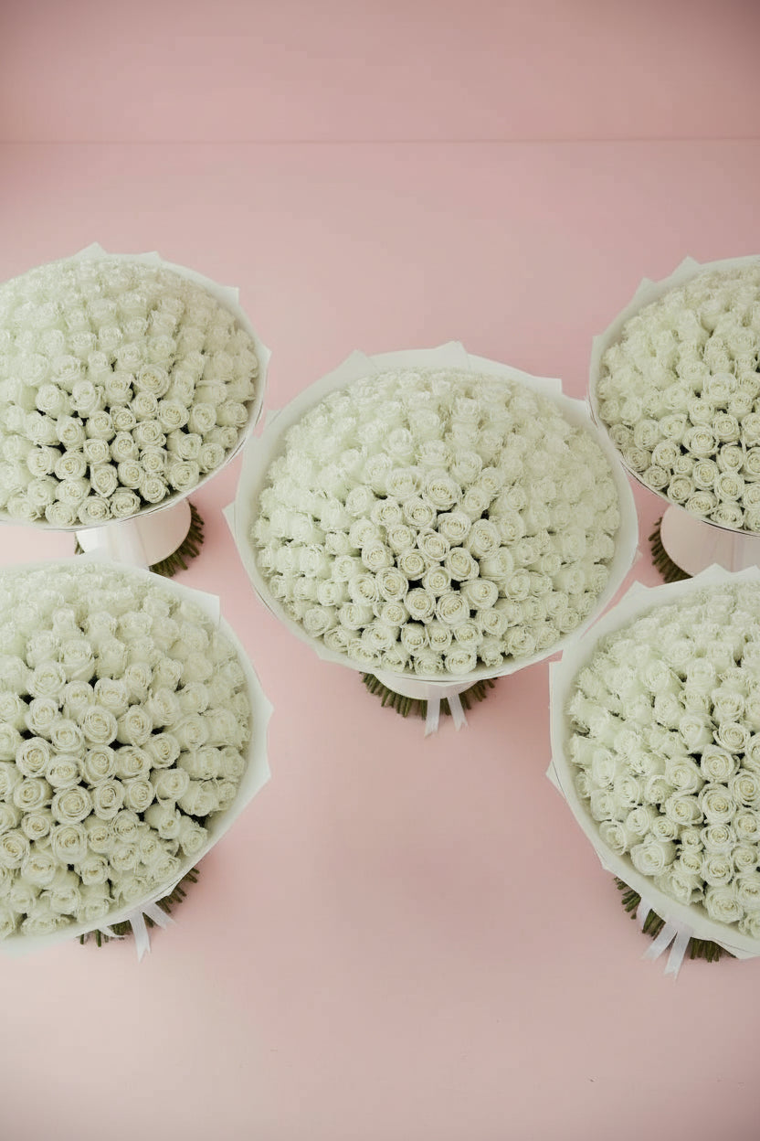 5 white rose bouquets