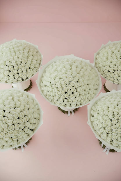 5 white rose bouquets