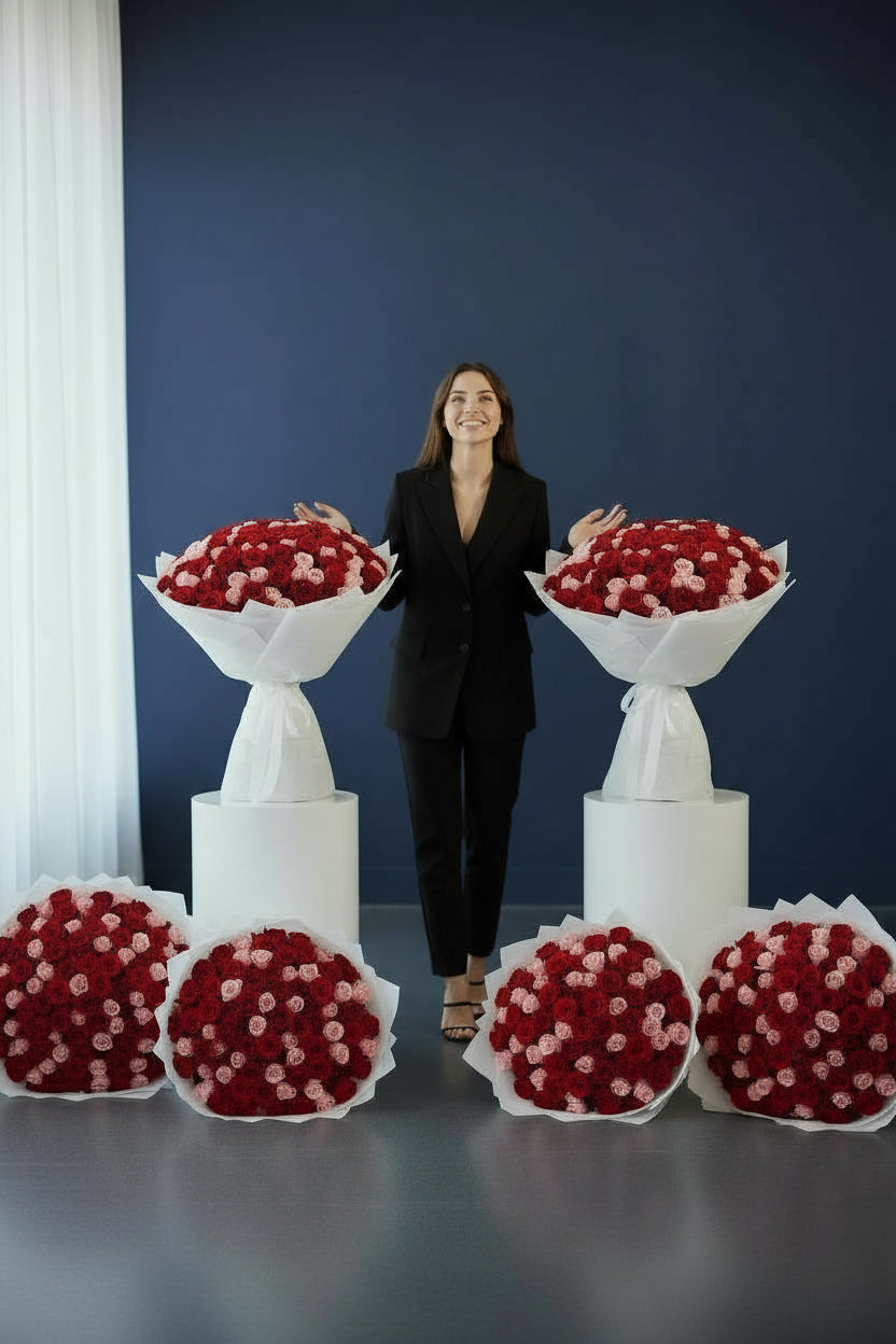 Luxury bouquet of 150 red and pink roses in white wrapping