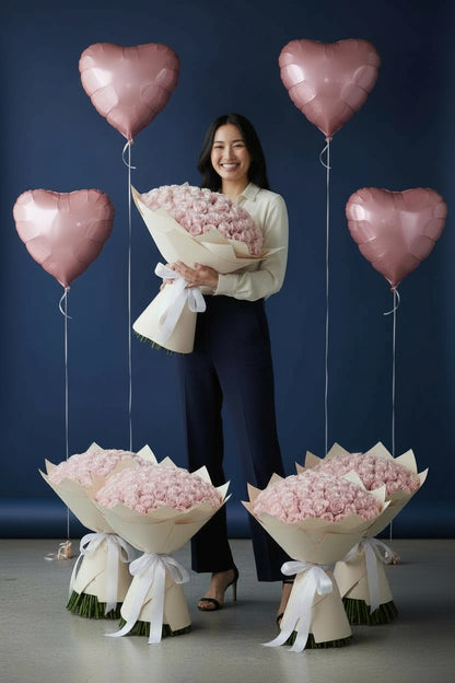 Pink room set with five 51 pink rose bouquets and four heart foil balloons