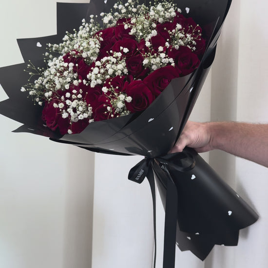 51 red roses and babies breath