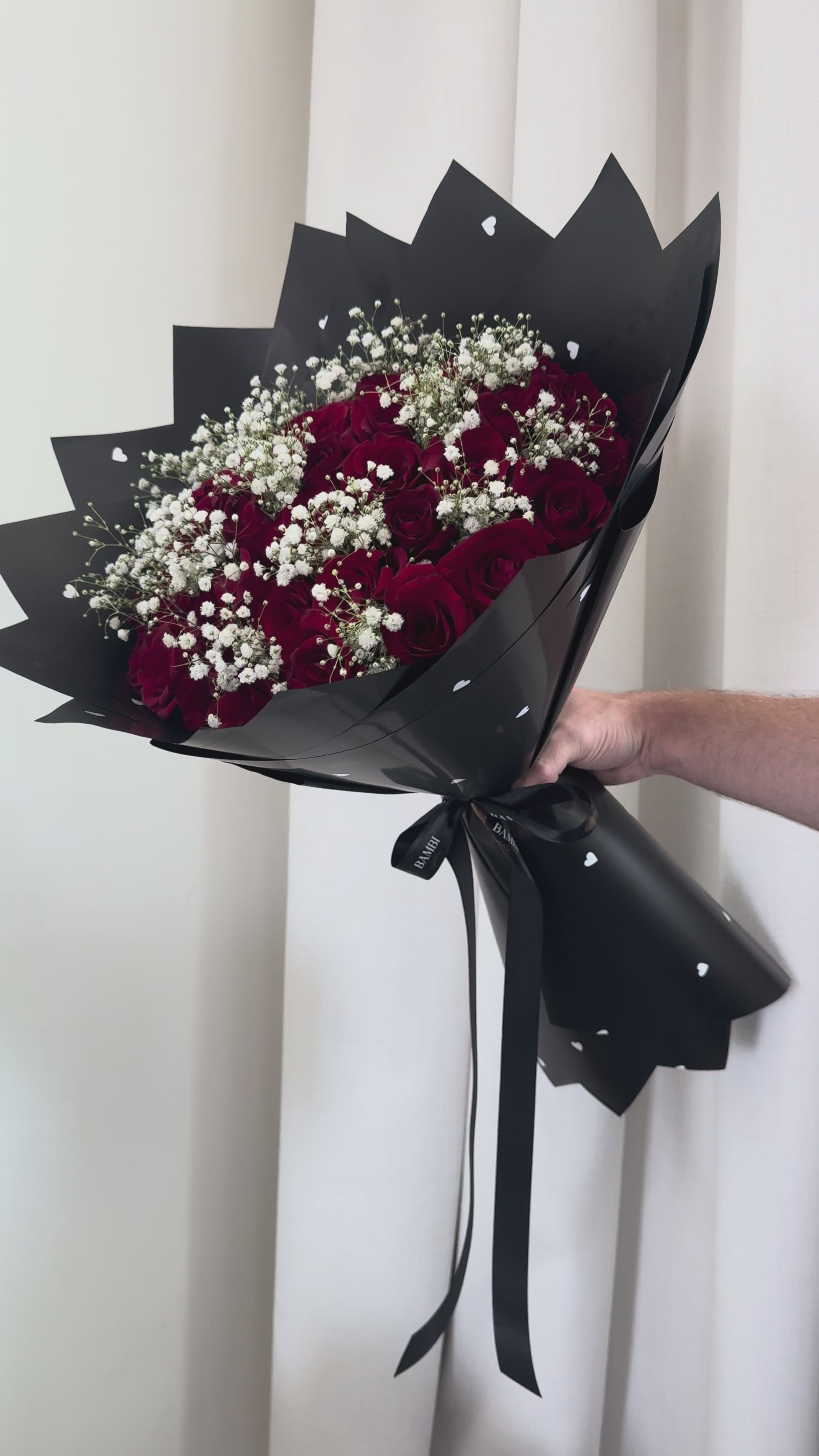 51 red roses and babies breath